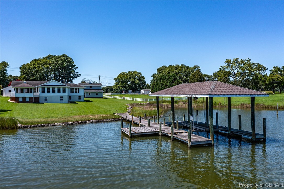 43 Locksley Court Reedville, VA 22539 - Photo 1 of 37 Dock area featuring a water view and a yard
