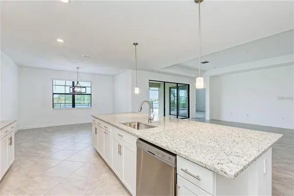 a kitchen with a sink and a window