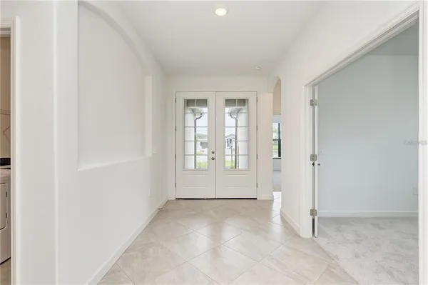 an empty room with windows