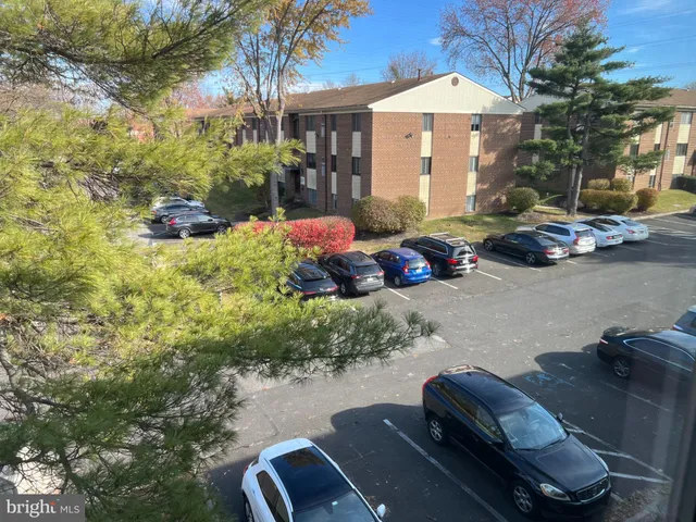 a backyard of a house with yard barbeque oven and outdoor seating