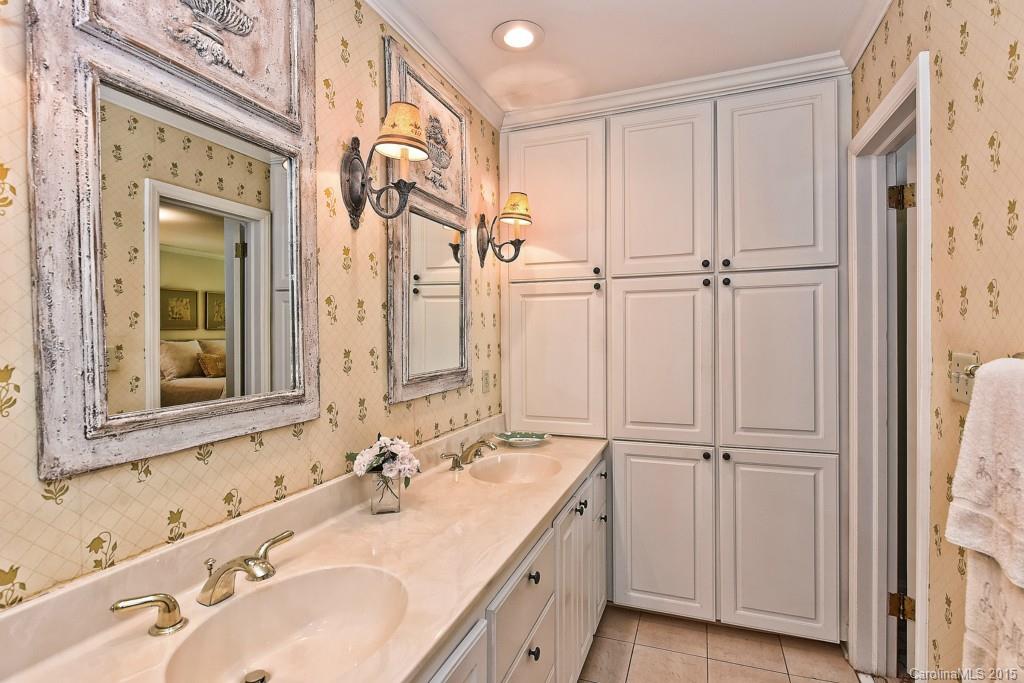 3118 Ferncliff Road Charlotte, NC 28211 - Photo 12 of 24 a bathroom with a sink and a mirror