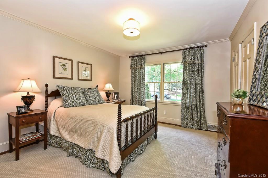 3118 Ferncliff Road Charlotte, NC 28211 - Photo 13 of 24 a bedroom with a bed and a window