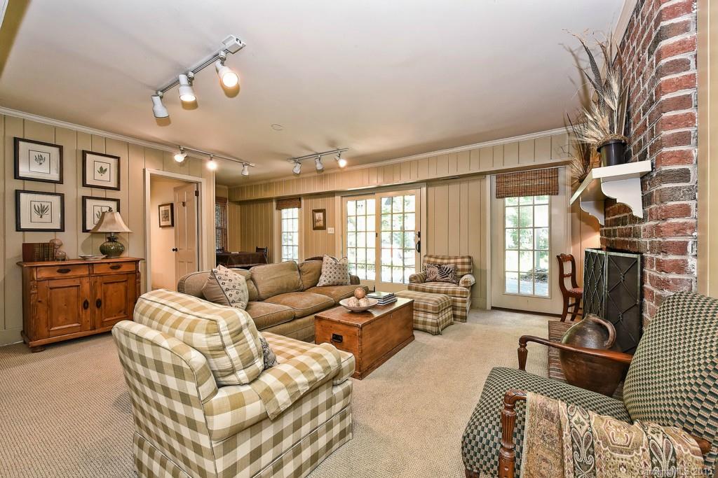 3118 Ferncliff Road Charlotte, NC 28211 - Photo 15 of 24 a living room with furniture and a flat screen tv