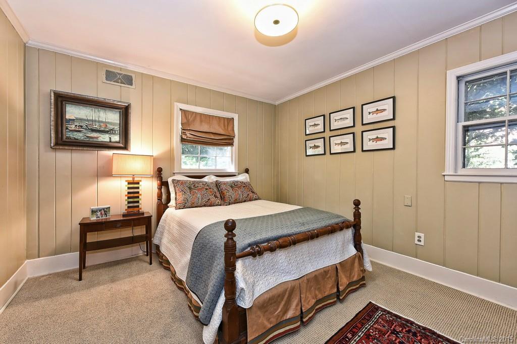 3118 Ferncliff Road Charlotte, NC 28211 - Photo 16 of 24 a bedroom with a bed and a window