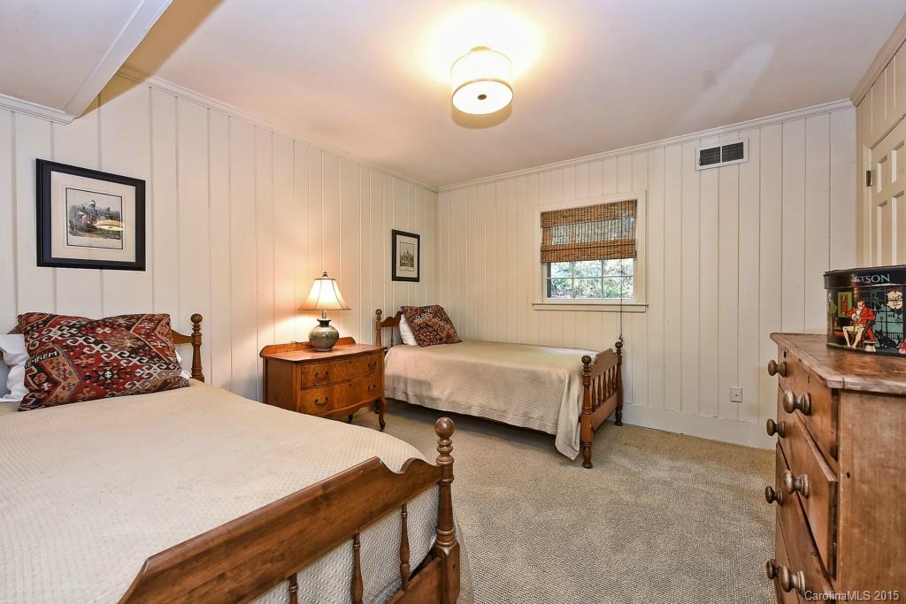 3118 Ferncliff Road Charlotte, NC 28211 - Photo 17 of 24 a bedroom with two beds and painting on the wall