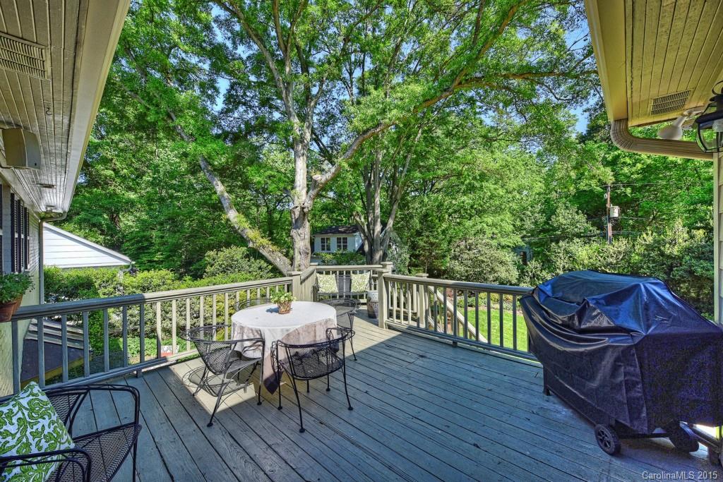 3118 Ferncliff Road Charlotte, NC 28211 - Photo 19 of 24 a view of a deck with chair and wooden floor