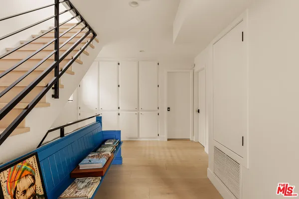 a view of entryway with wooden floor