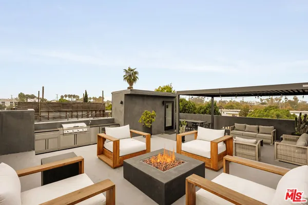 a outdoor living space with furniture and garden view