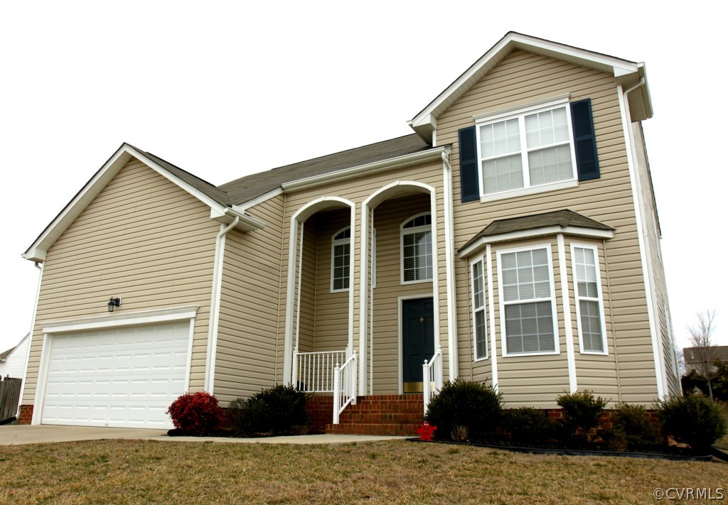 2930 Burley Ridge Terrace Chester, VA 23831 - Photo 1 of 24 a view of a house with a small yard and a large window