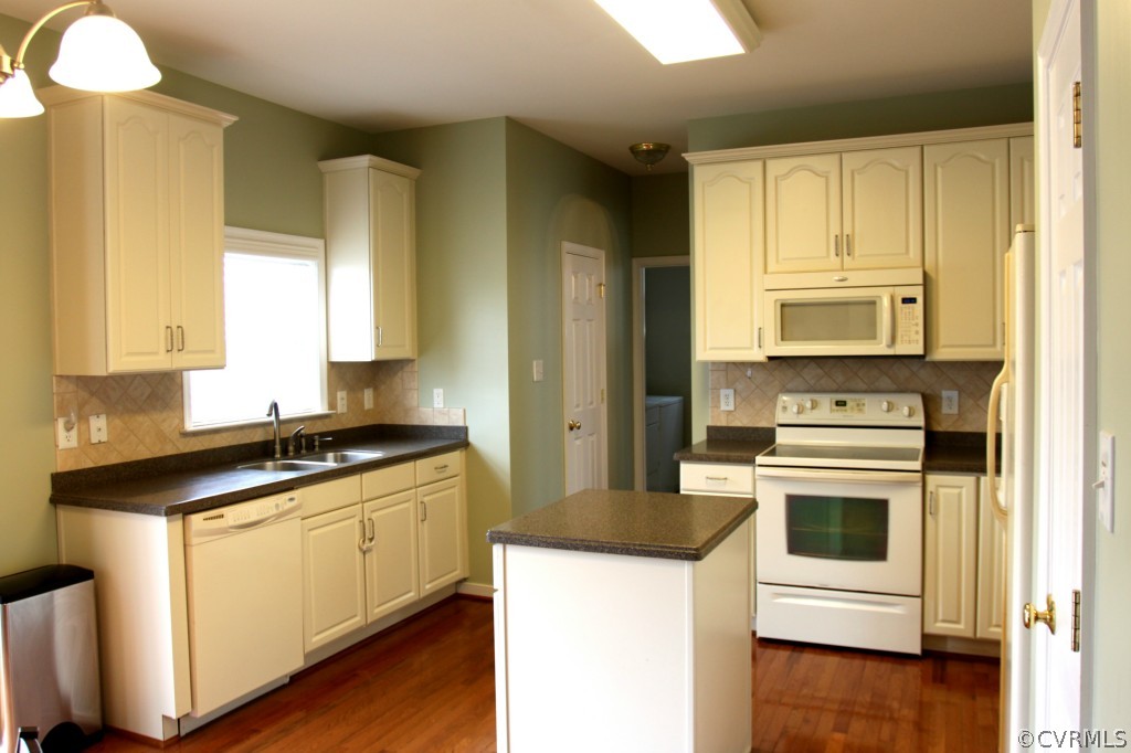 2930 Burley Ridge Terrace Chester, VA 23831 - Photo 6 of 24 a kitchen with a stove top oven sink and cabinets