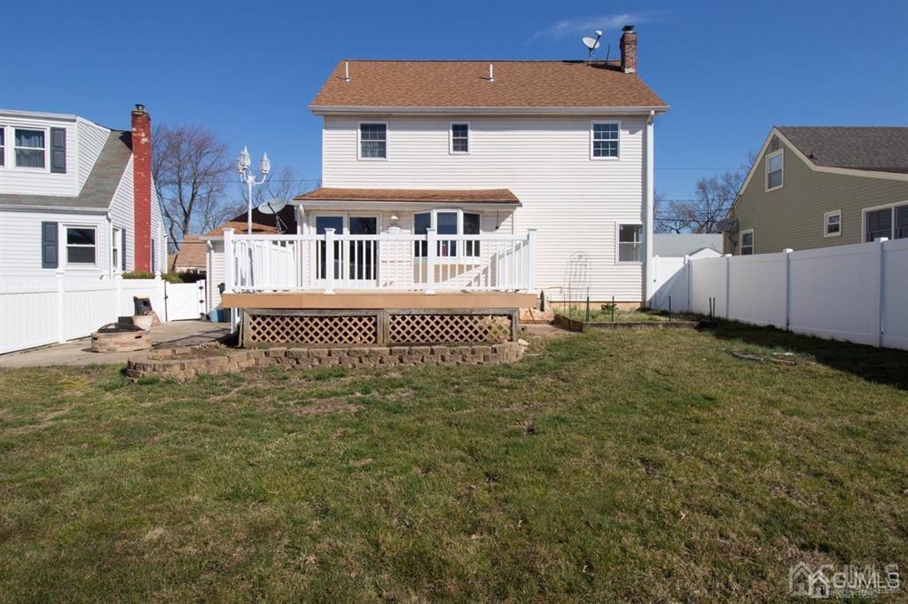 190 Midfield Road Colonia, NJ 07067 - Photo 14 of 17 a front view of a house with a yard