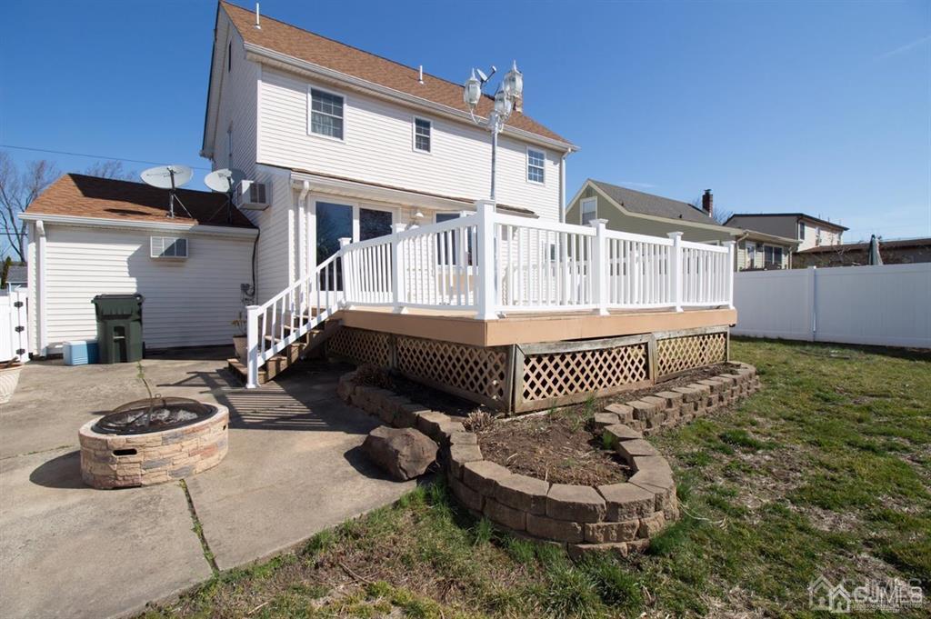 190 Midfield Road Colonia, NJ 07067 - Photo 15 of 17 a front view of a house with garden