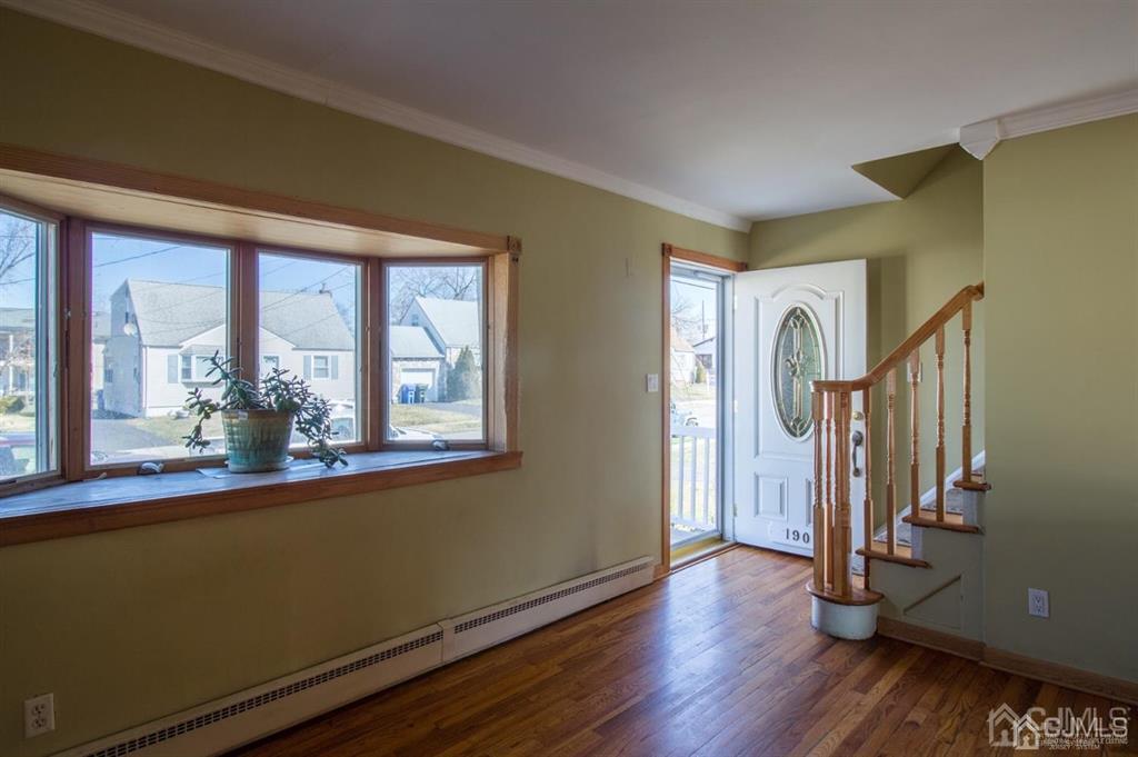 190 Midfield Road Colonia, NJ 07067 - Photo 2 of 17 a view of a room with wooden floor and walls