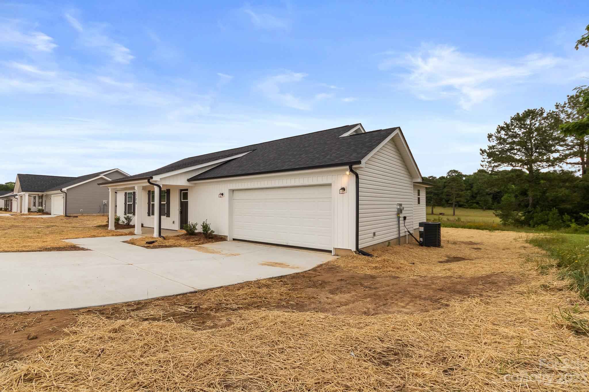 1509 Rehobeth Church Road Shelby, NC 28150 - Photo 2 of 34 a view of a house with snow on the road
