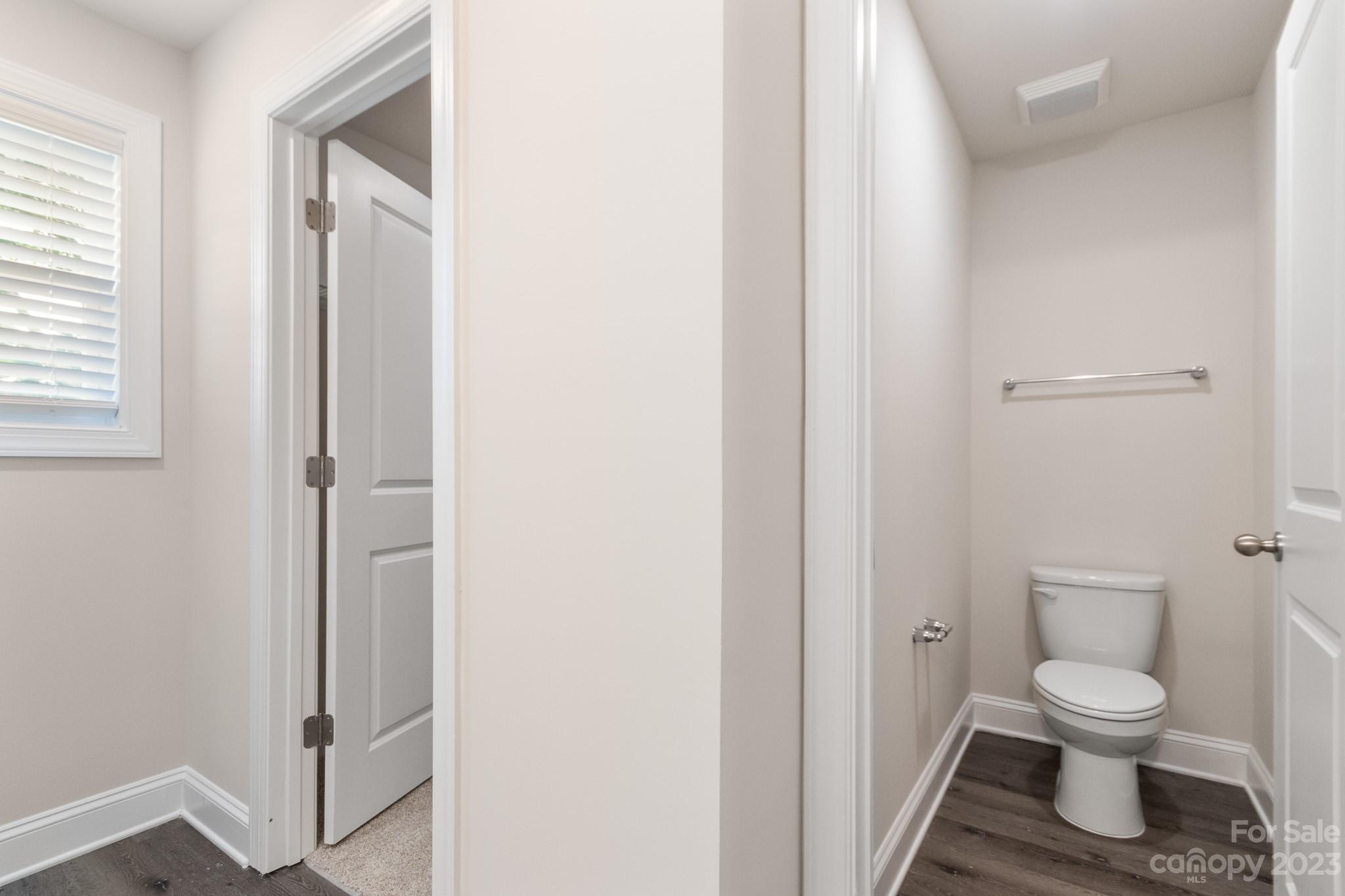 1509 Rehobeth Church Road Shelby, NC 28150 - Photo 22 of 34 a white toilet sitting next to a bathroom sink