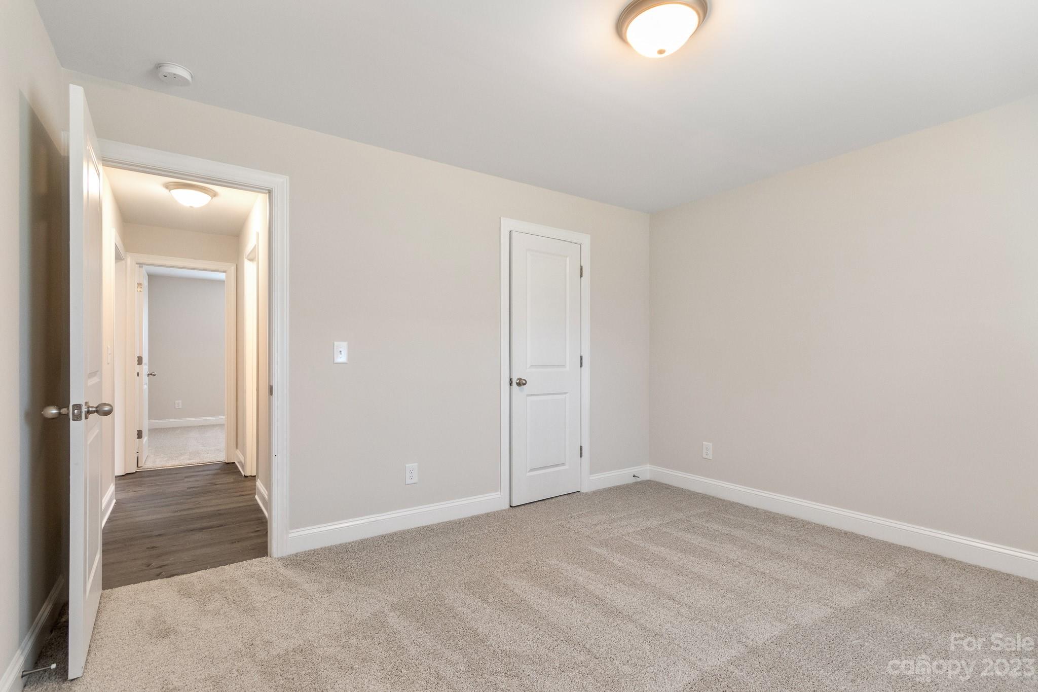 1509 Rehobeth Church Road Shelby, NC 28150 - Photo 29 of 34 an empty room with cabinet and mirror
