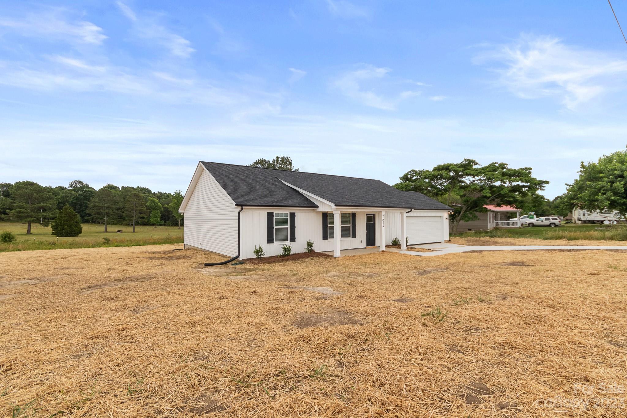 1509 Rehobeth Church Road Shelby, NC 28150 - Photo 3 of 34 a house with river in front of it