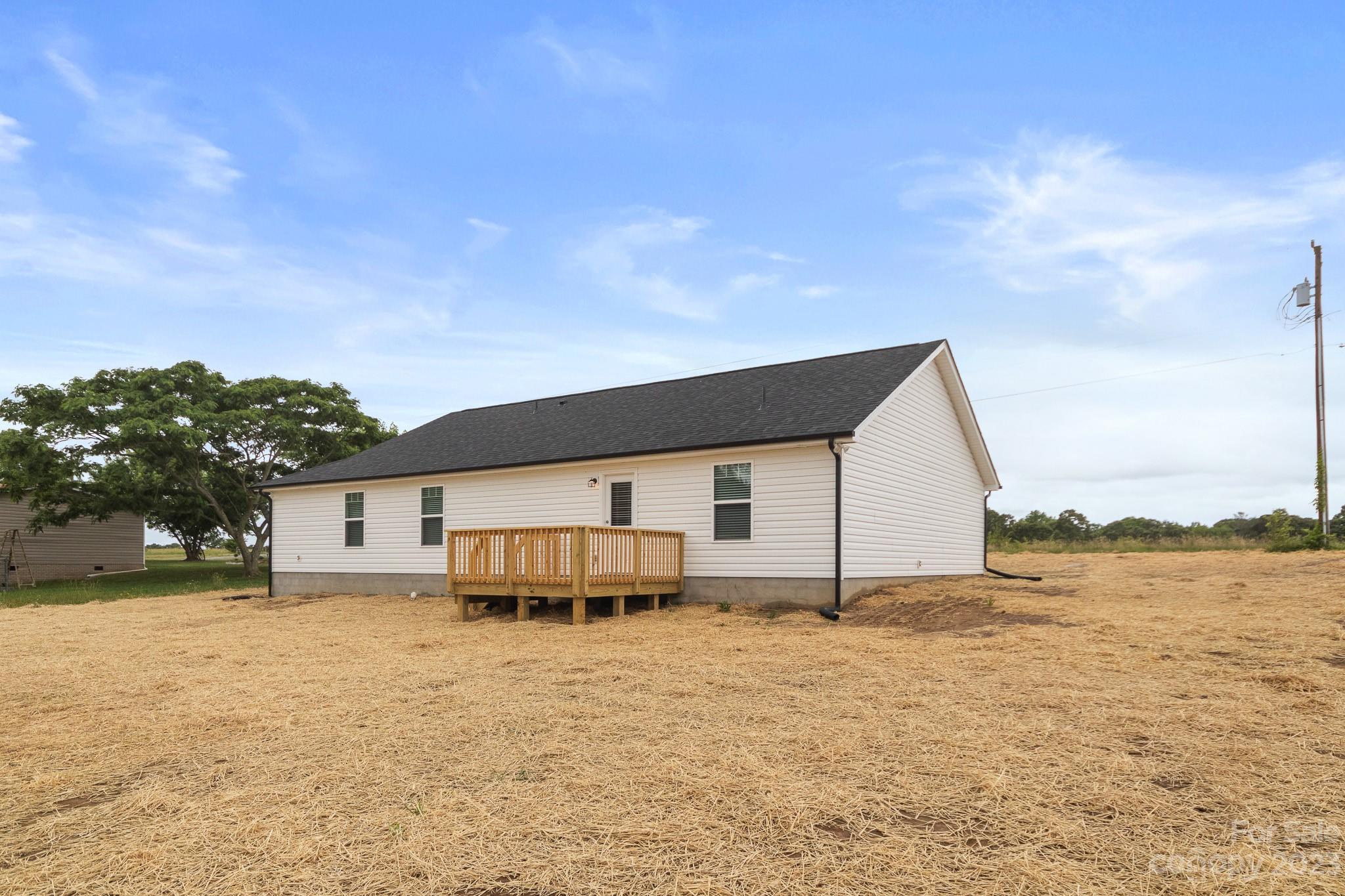 1509 Rehobeth Church Road Shelby, NC 28150 - Photo 34 of 34 a backyard of a house with yard and garage