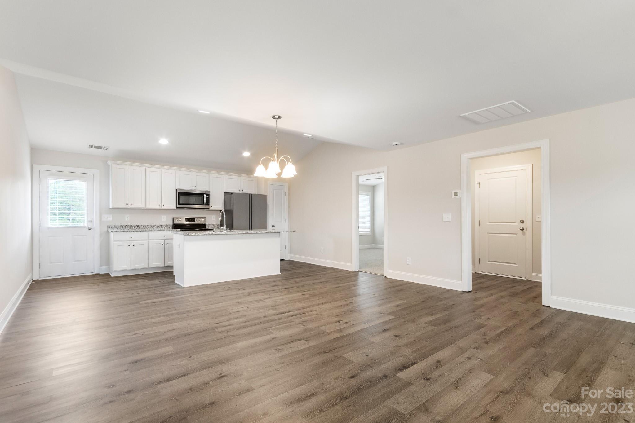 1509 Rehobeth Church Road Shelby, NC 28150 - Photo 7 of 34 a view of kitchen with wooden floor and kitchen