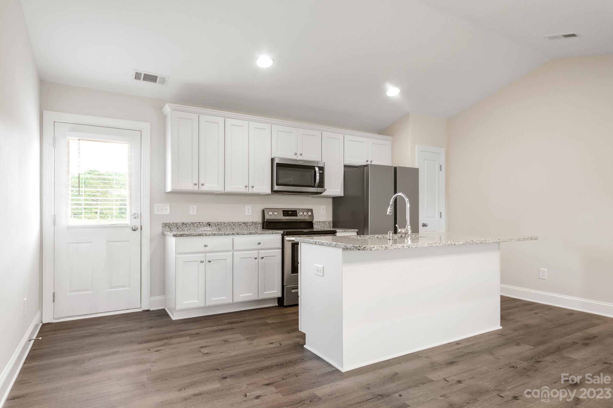 1509 Rehobeth Church Road Shelby, NC 28150 - Photo 9 of 34 a kitchen with appliances a sink and a microwave