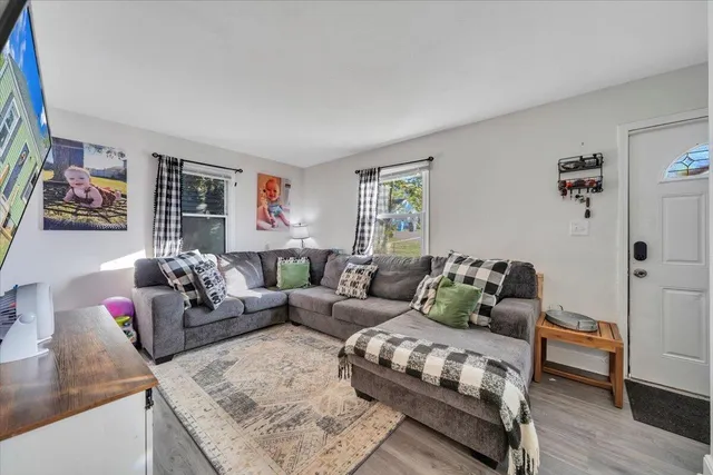 a living room with furniture and a couch