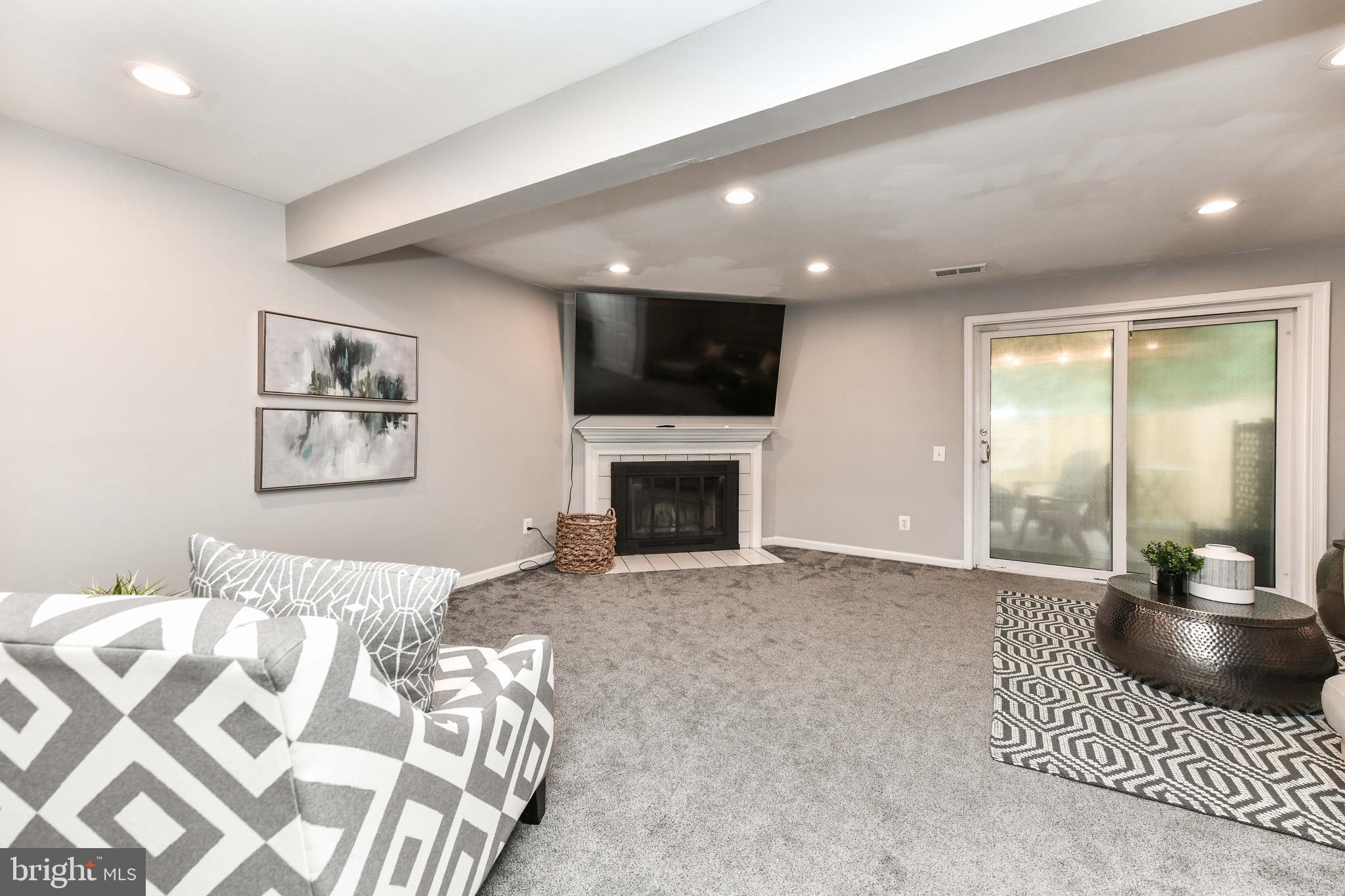 43792 Laburnum Square Ashburn, VA 20147 - Photo 29 of 46 Multi use recreation room with wood burning F/P