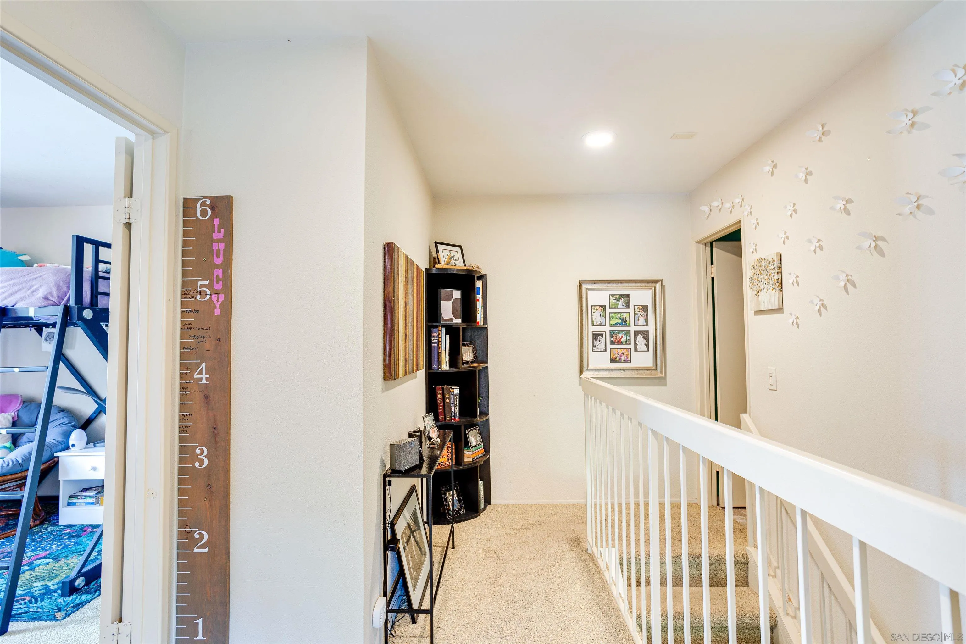 13657 Comuna Drive Poway, CA 92064 - Photo 12 of 36 a view of a hallway with windows and closet