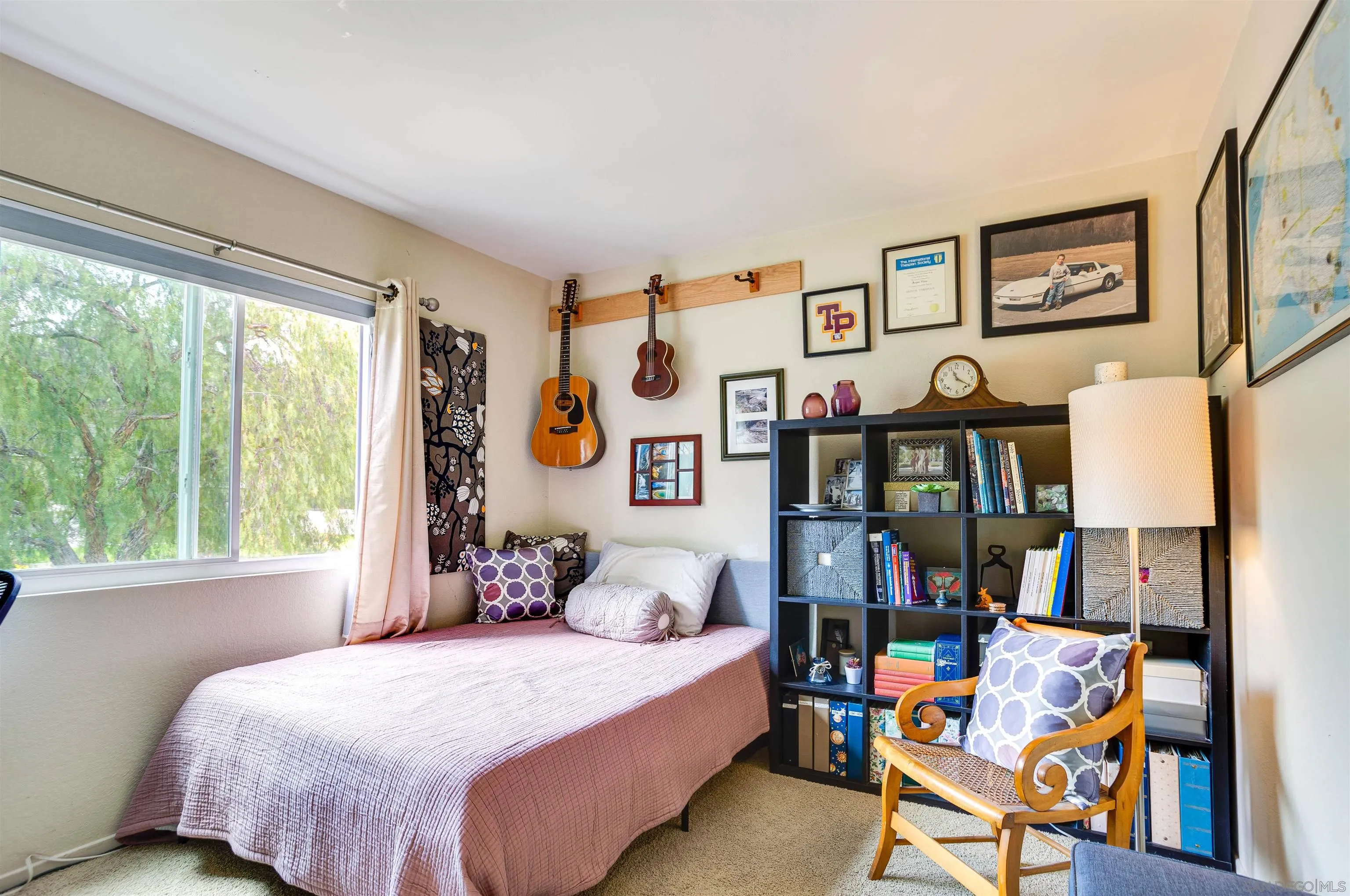 13657 Comuna Drive Poway, CA 92064 - Photo 13 of 36 a bedroom with a bed and a large window