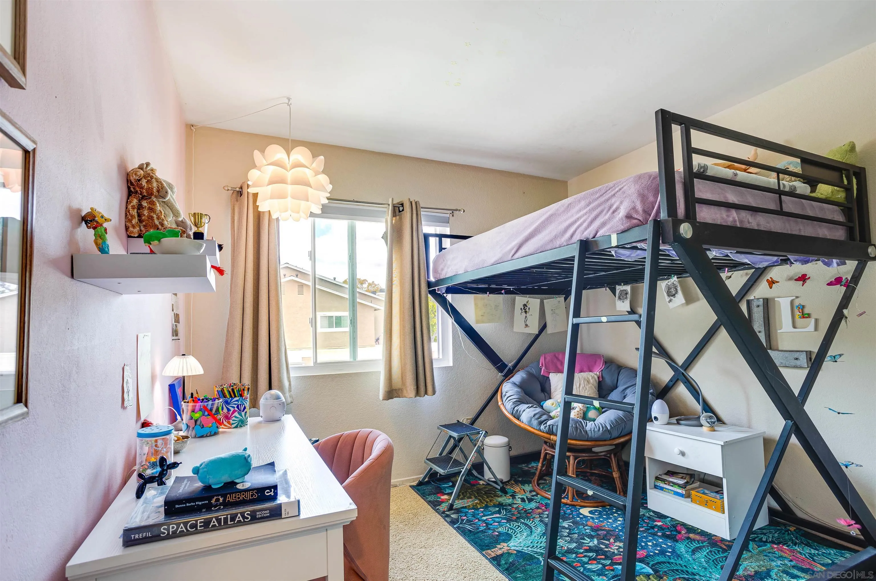 13657 Comuna Drive Poway, CA 92064 - Photo 14 of 36 a living room with furniture a rug and a window