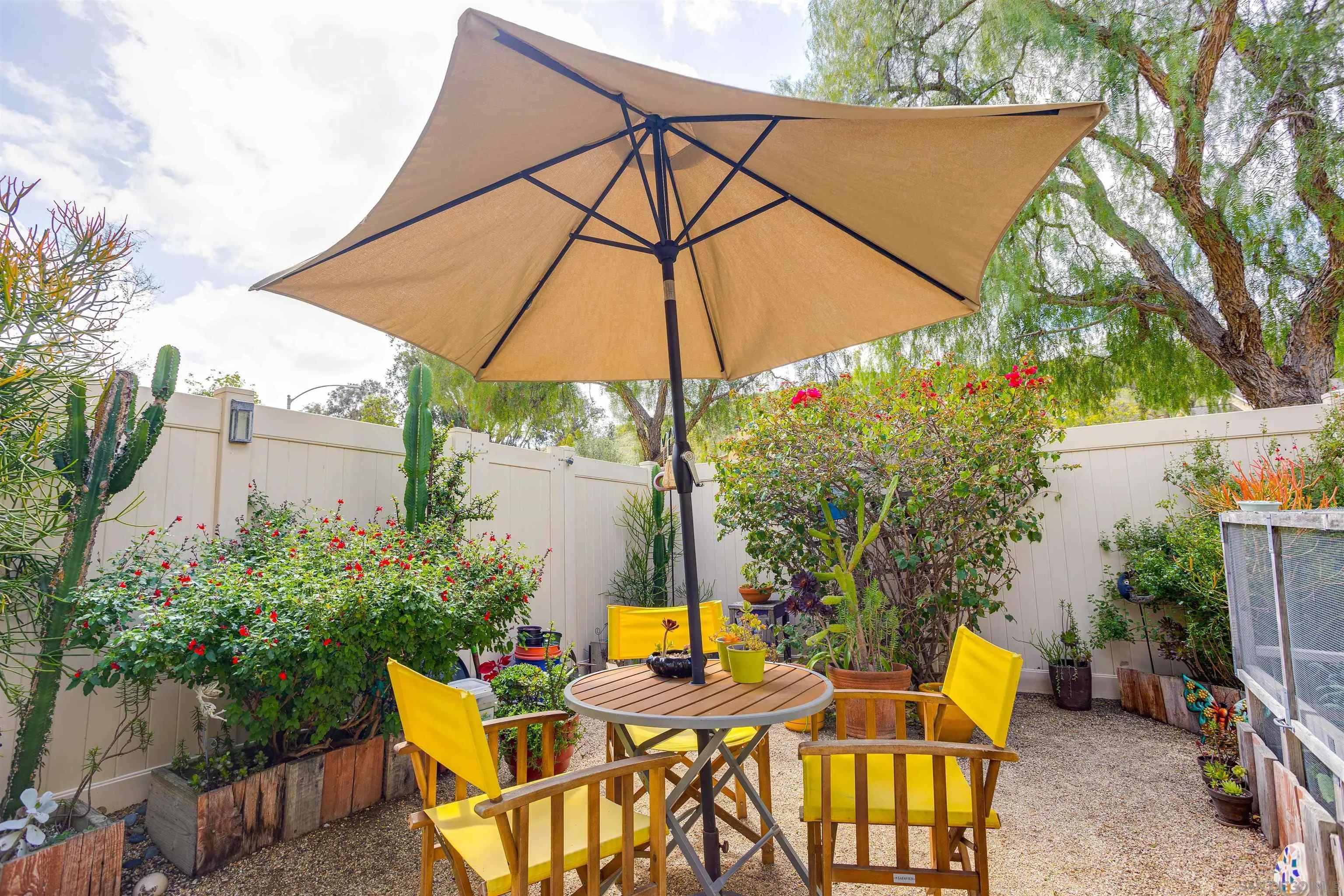 13657 Comuna Drive Poway, CA 92064 - Photo 21 of 36 an outdoor space with furniture and umbrella