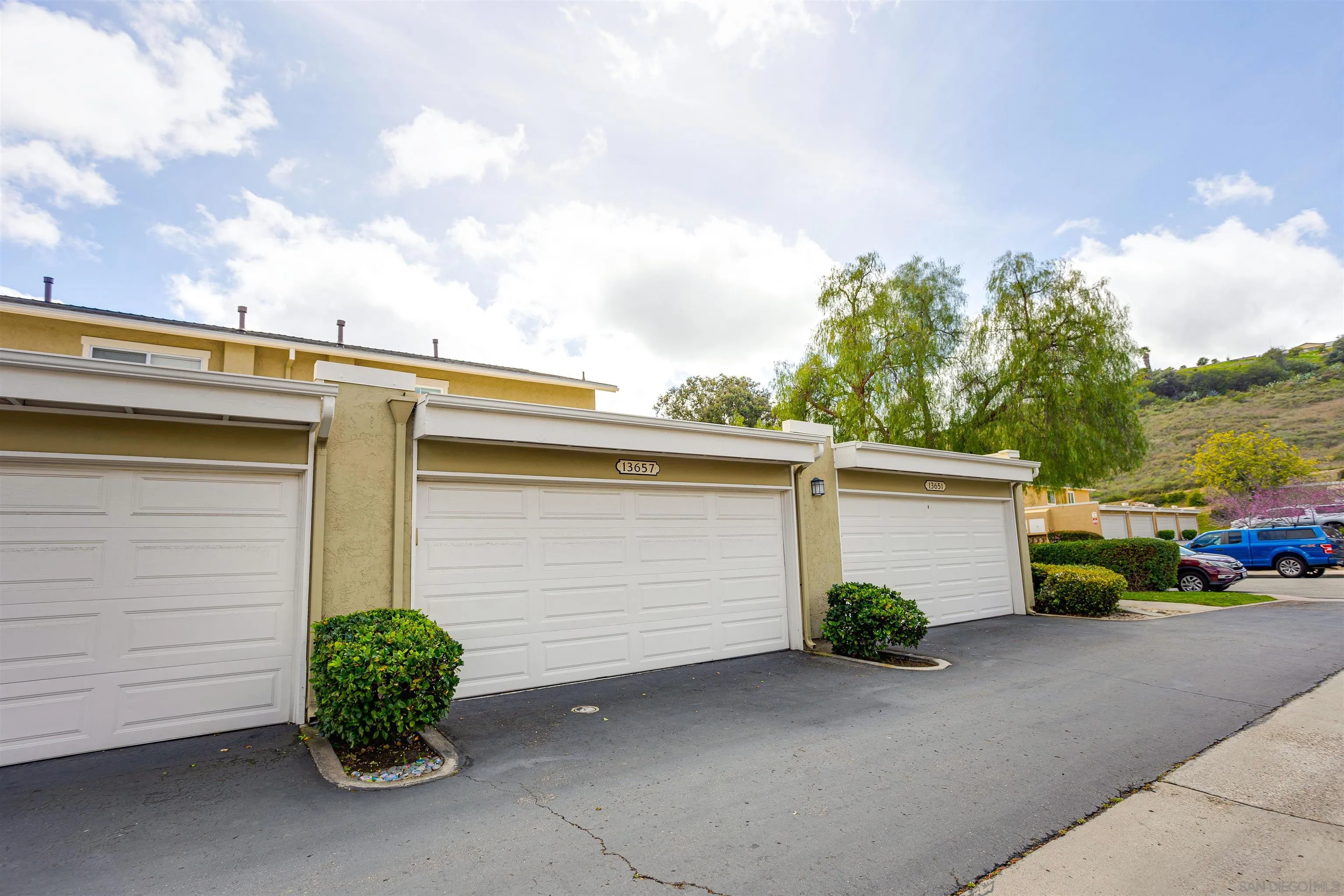 13657 Comuna Drive Poway, CA 92064 - Photo 26 of 36 a house view with a garden space