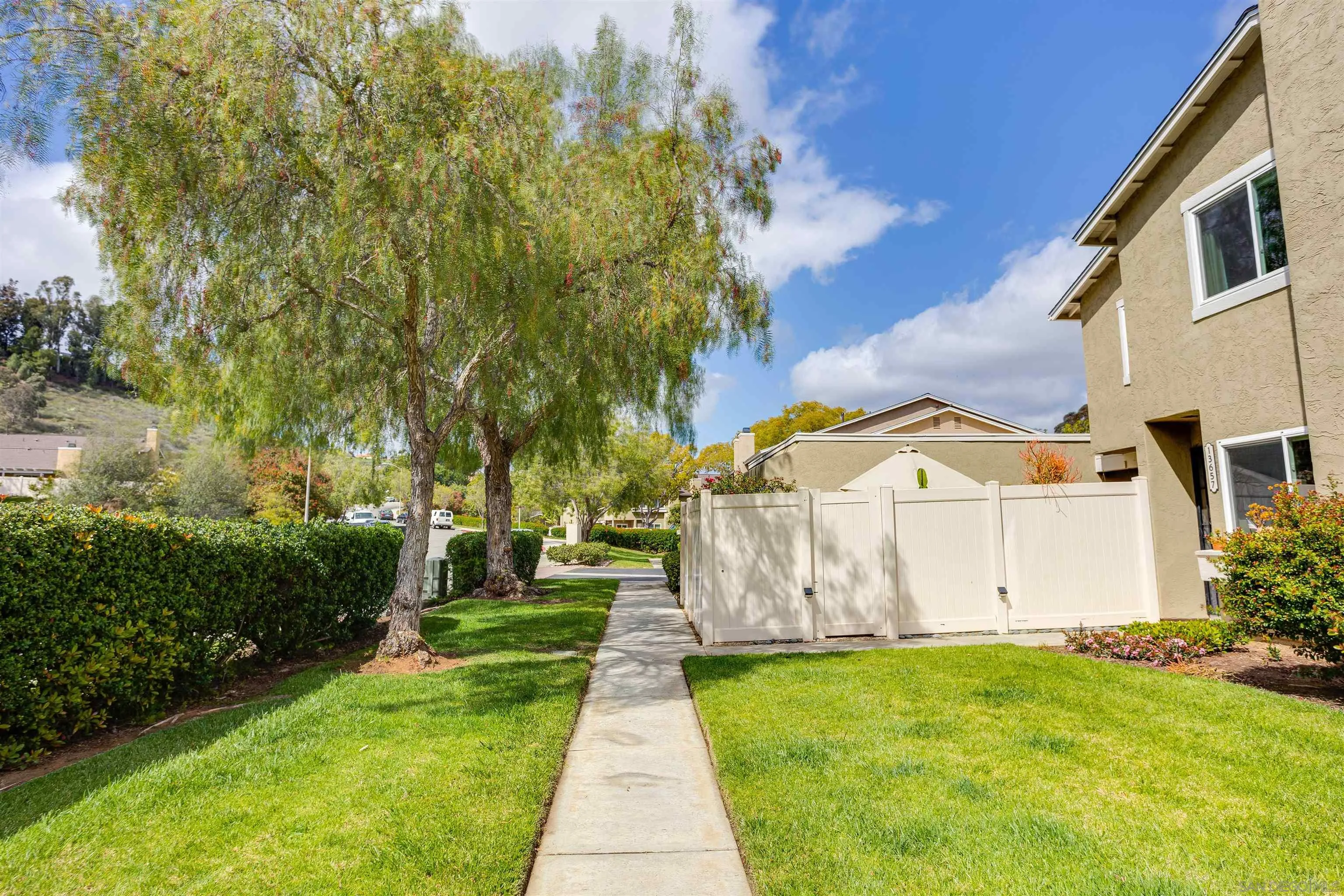 13657 Comuna Drive Poway, CA 92064 - Photo 29 of 36 a view of a back yard of the house