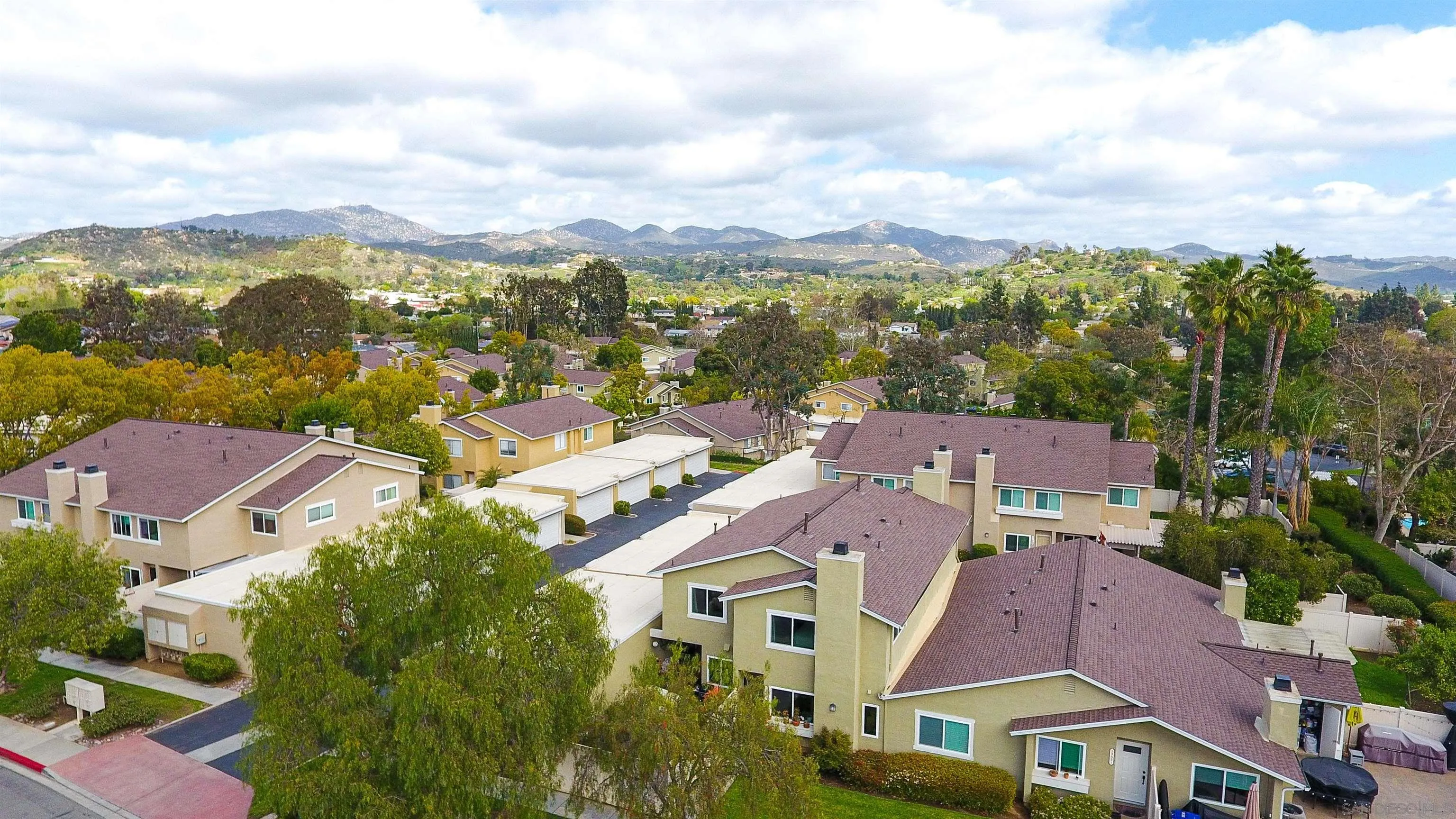 13657 Comuna Drive Poway, CA 92064 - Photo 36 of 36 an aerial view of residential houses with outdoor space