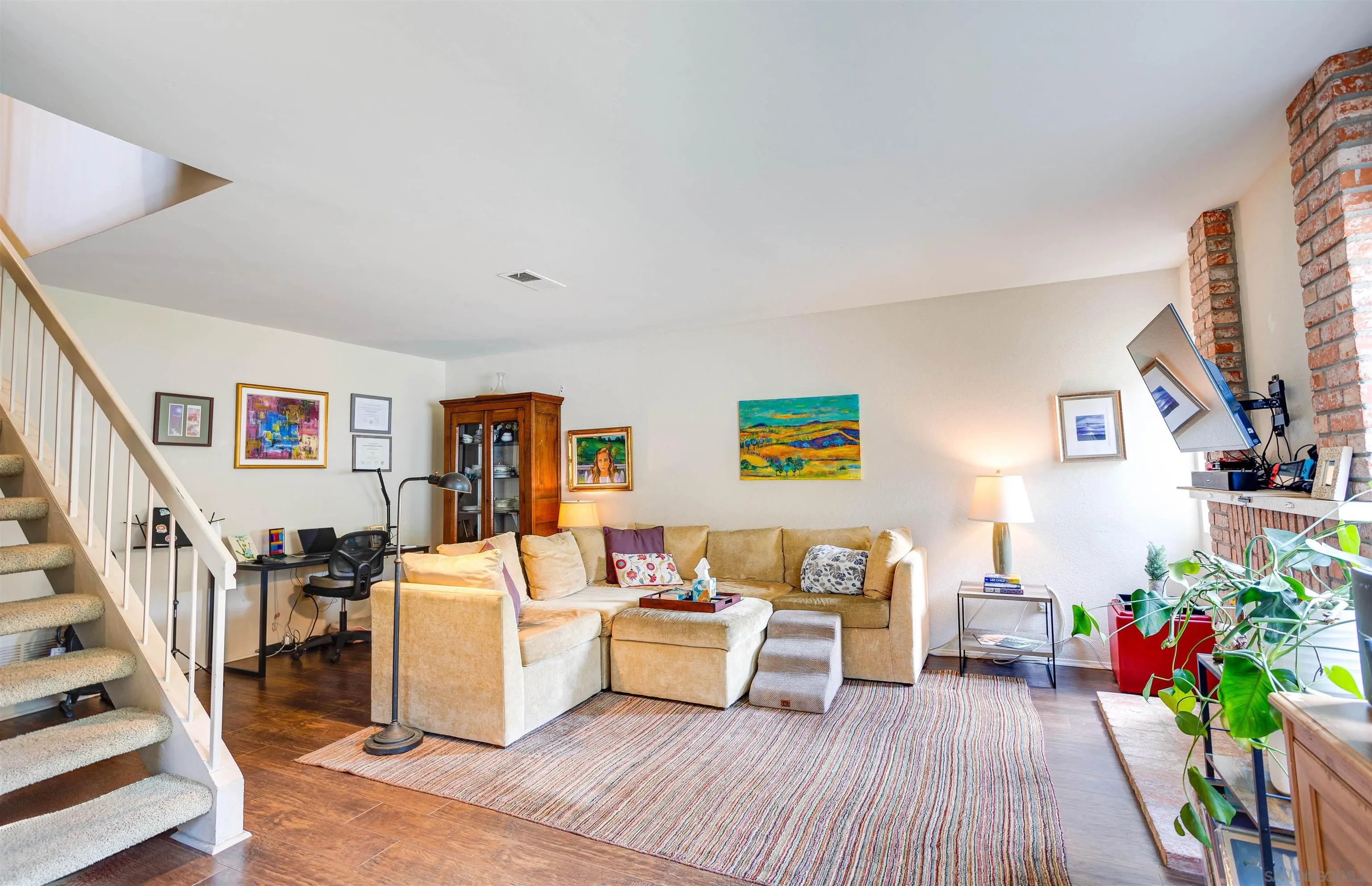 13657 Comuna Drive Poway, CA 92064 - Photo 8 of 36 a living room with furniture and a wooden floor