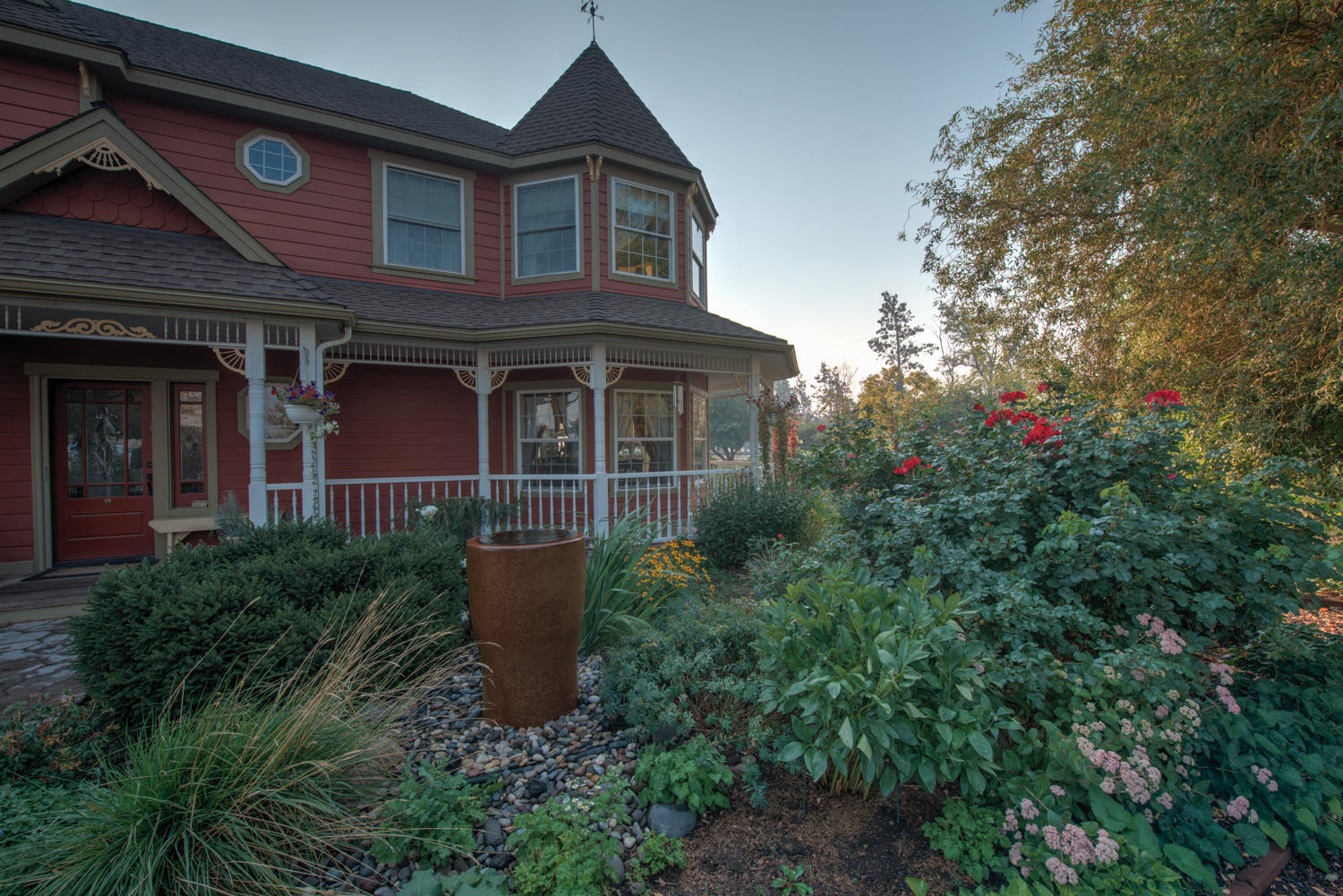 22222 Erickson Road Bend, OR 97701 - Photo 54 of 100 a front view of a house with a garden