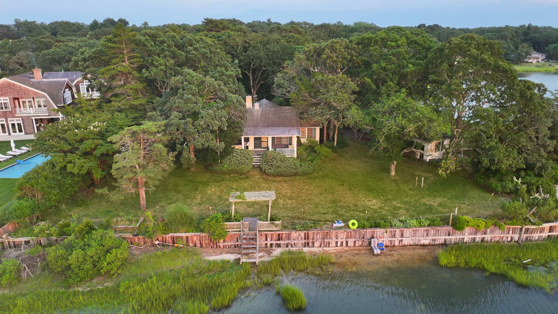 311 Noyack Road Southampton, NY 11968 - Photo 3 of 5 an aerial view of residential houses with outdoor space and river