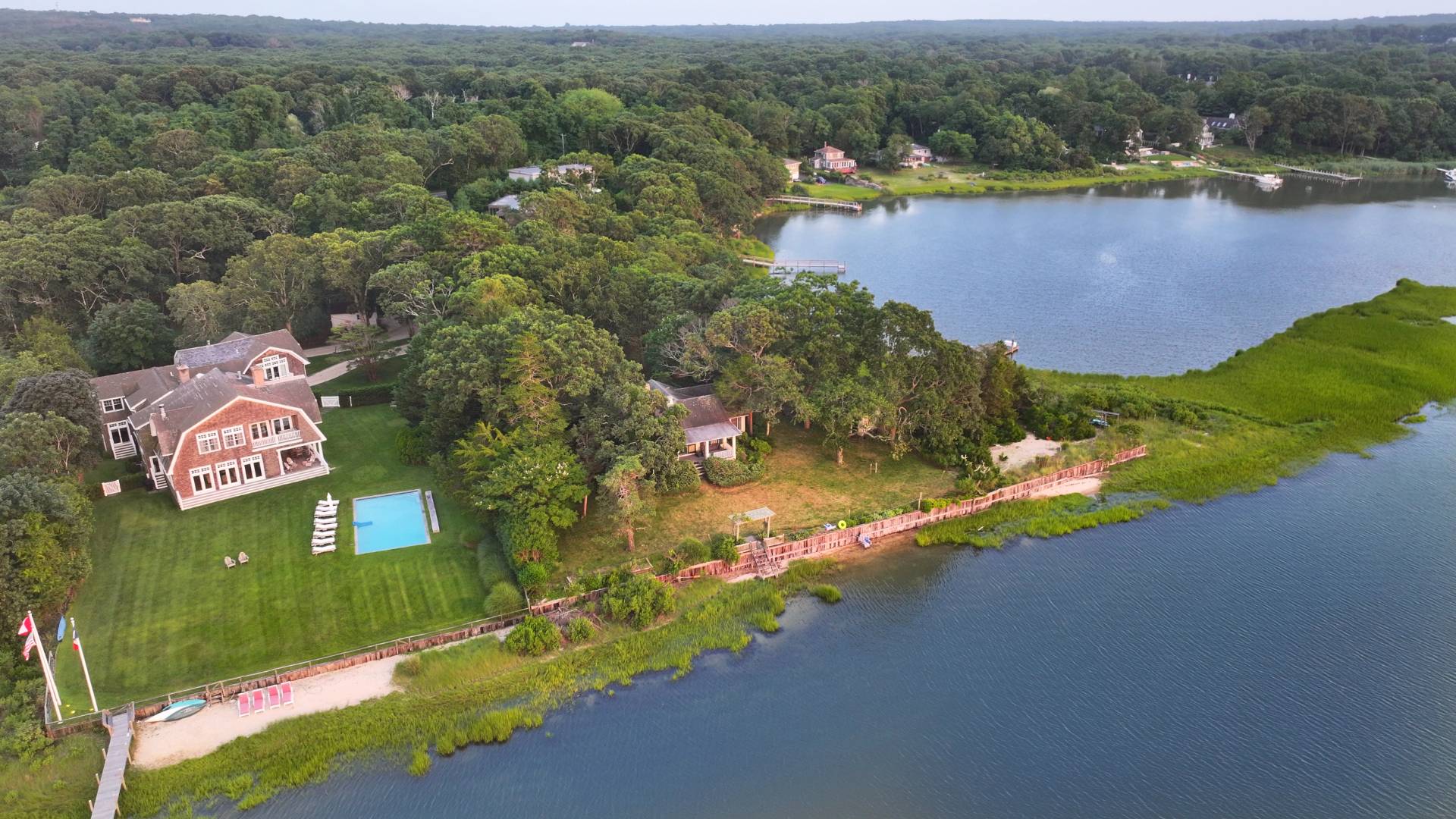 311 Noyack Road Southampton, NY 11968 - Photo 5 of 5 an aerial view of lake residential house with outdoor space and seating