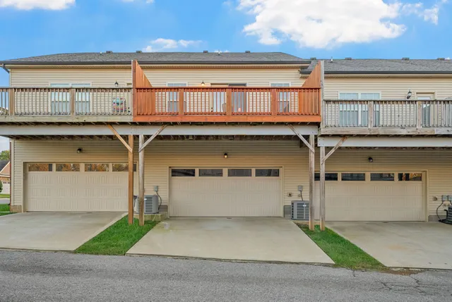 a view of a building with sitting area