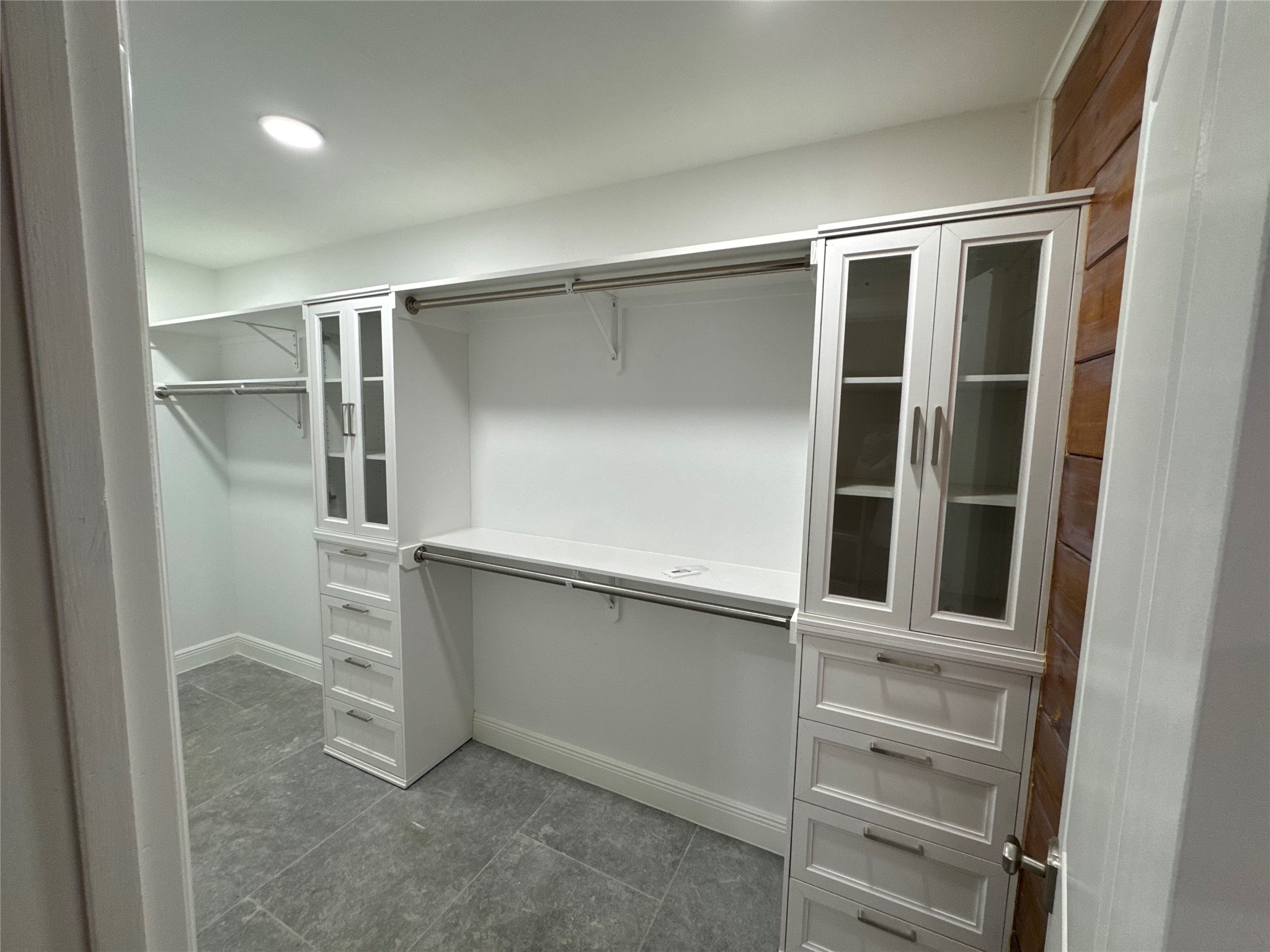 24879 Macedonia Road Hockley, TX 77447 - Photo 24 of 32 a room with walk in closet and stairs