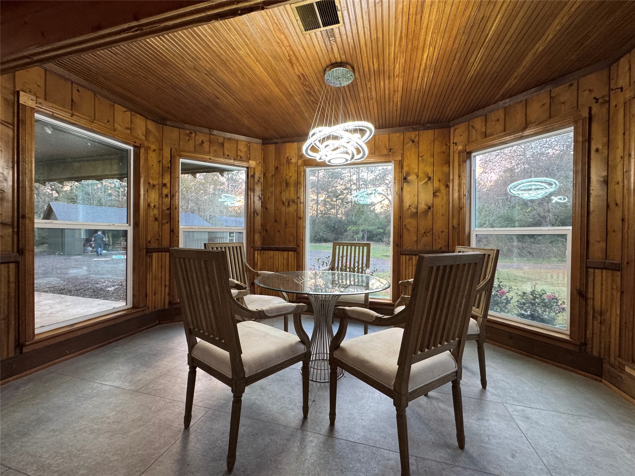 24879 Macedonia Road Hockley, TX 77447 - Photo 27 of 32 a view of a dining room with furniture wooden floor and chandelier