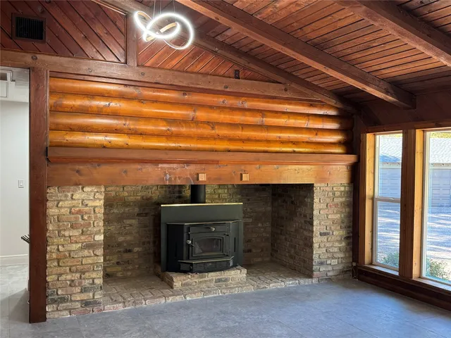 a kitchen with a stove and a sink