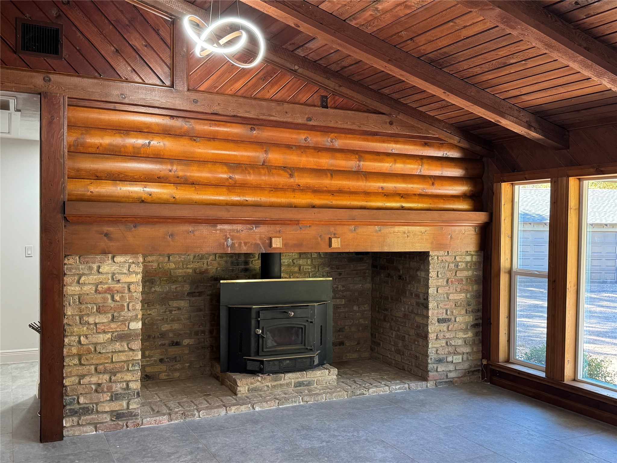 24879 Macedonia Road Hockley, TX 77447 - Photo 8 of 32 a view of a fireplace with an empty room