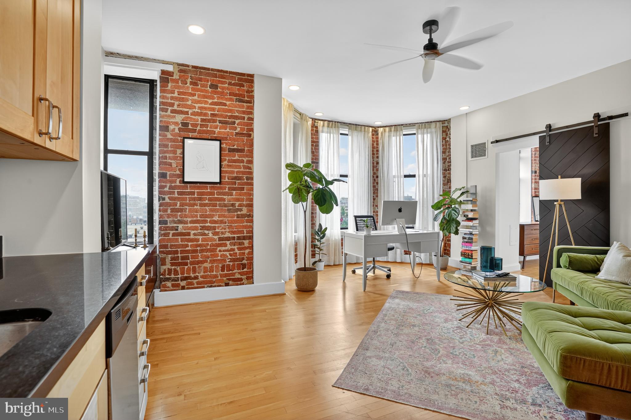 1615 Q Street Northwest, Unit 601 Washington, DC 20009 - Photo 6 of 21 a living room with furniture