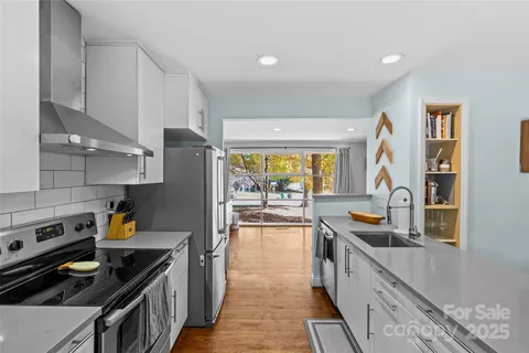 a bathroom with a sink toilet and mirror