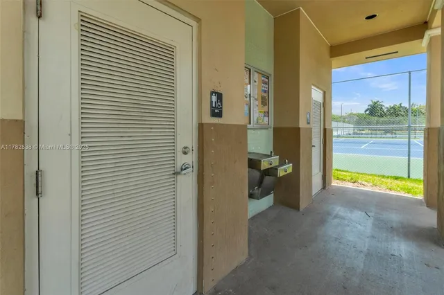 a view of hallway with livingroom