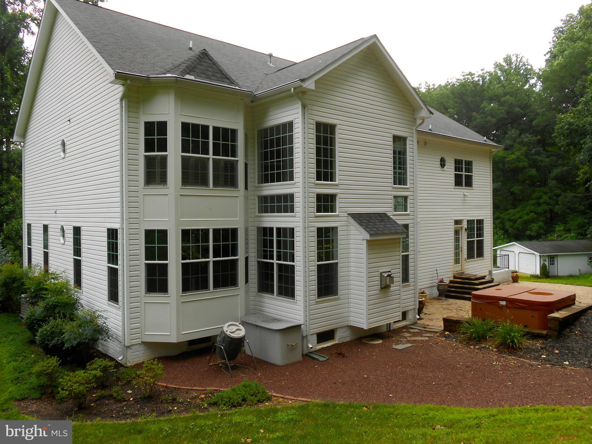 6659 South Clifton Road Frederick, MD 21703 - Photo 22 of 30 a house view with a garden space