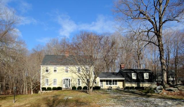 57 Pheasant Run Road Wilton, CT 06897 - Photo 1 of 1 a view of a large building with a street
