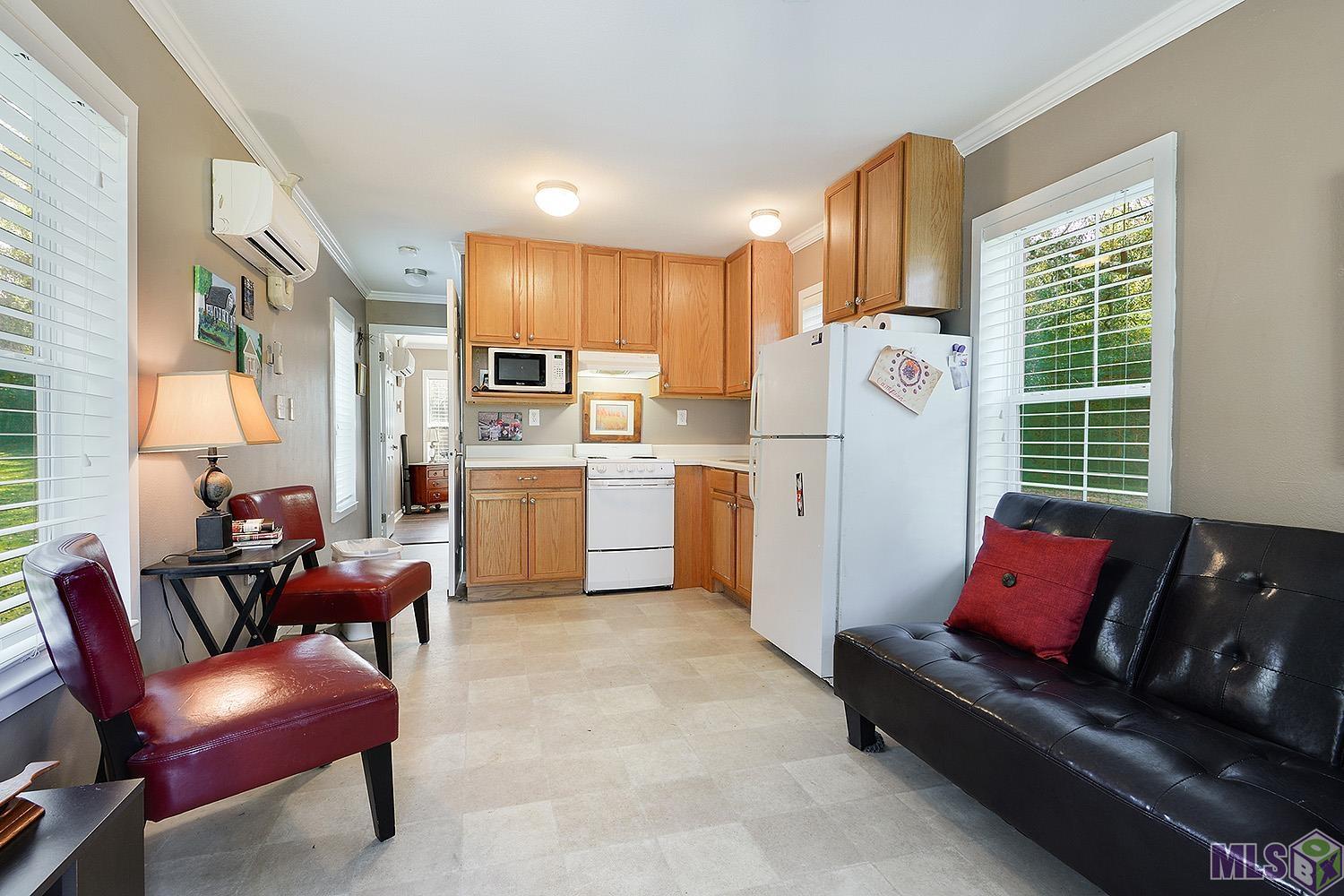 1558 Tommy Whitaker Road St. Francisville, LA 70775 - Photo 13 of 41 Virtually staged Den in Cottage