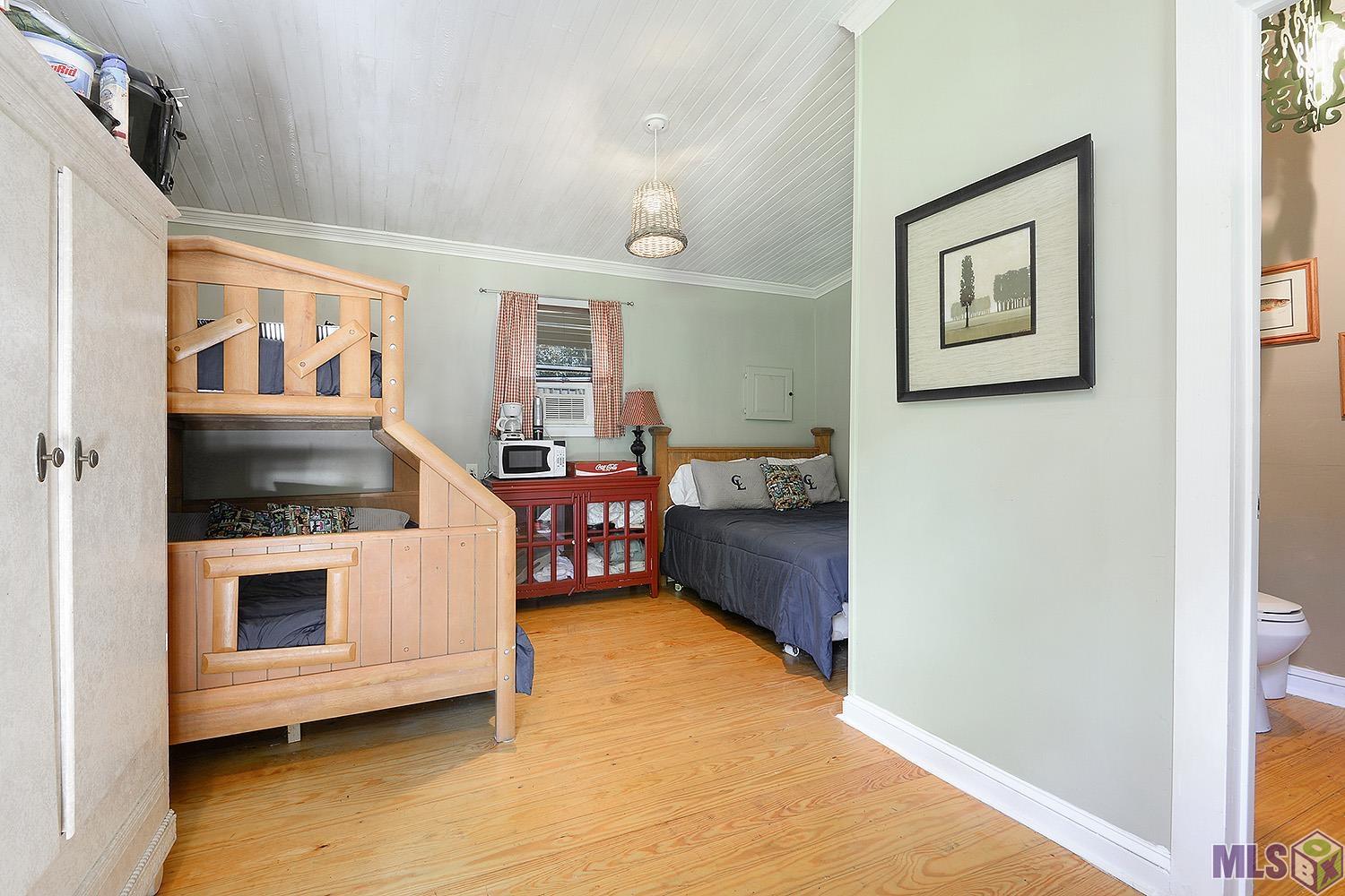 1558 Tommy Whitaker Road St. Francisville, LA 70775 - Photo 22 of 41 Viritually Staged Bunkhouse