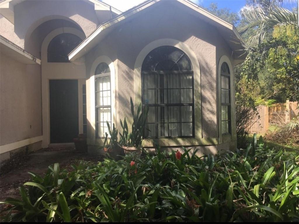 2416 Tommys Turn Oviedo, FL 32766 - Photo 1 of 1 a house view with a outdoor space